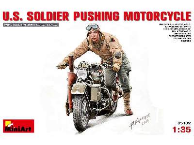 U.S. Soldier Pushing Motorcycle - image 1