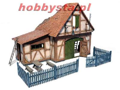 Shed With Wooden Fence - image 1