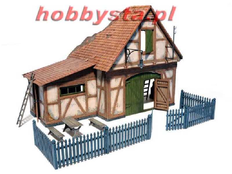 Shed With Wooden Fence - image 1