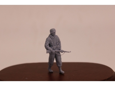 German Wwii Fallschirmjäger In Winter Dress With Helmet And K98 Rifle - image 1