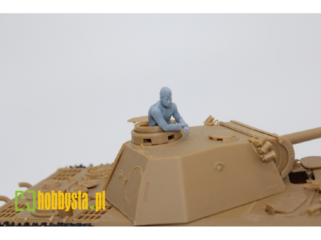 German Wwii Tank Crew Member Standing Both Hands On The Turret - image 1