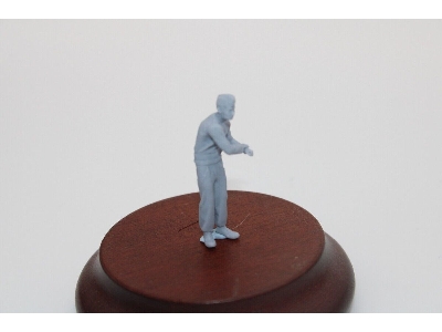 Tank Man Standing Hands On Tower Roof - image 1