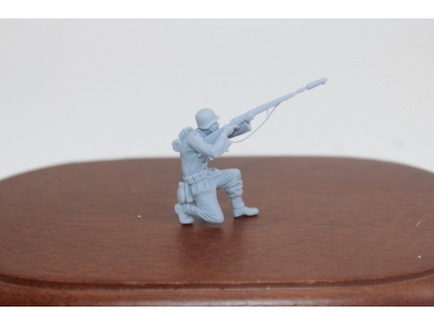 German Wwii Soldier Keening Firing With Riflegrenade - image 1