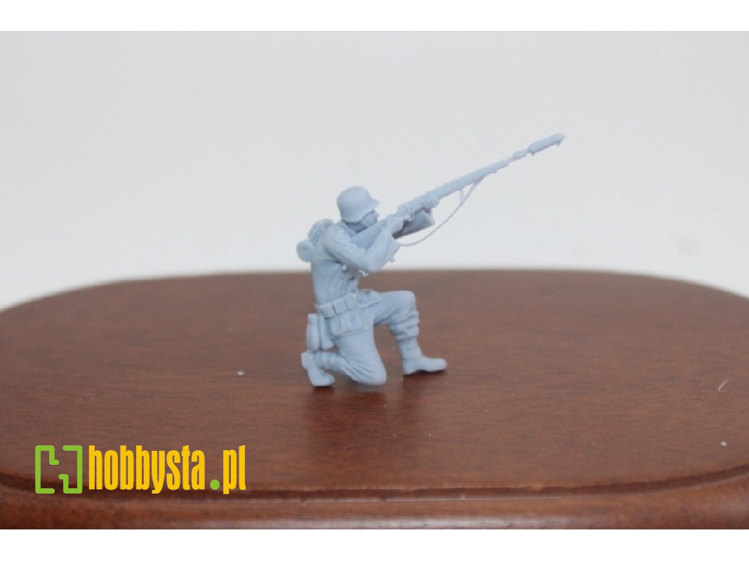 German Wwii Soldier Keening Firing With Riflegrenade - image 1