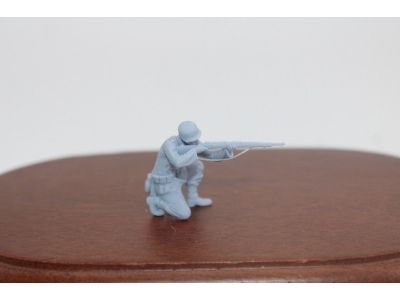 German Wwii Soldier Keeing Shooting With Rifle - image 1