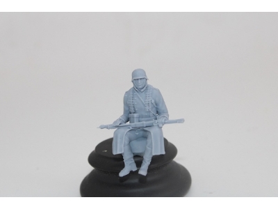 German Soldier Sitting In Greycoat With Mg42 - image 1