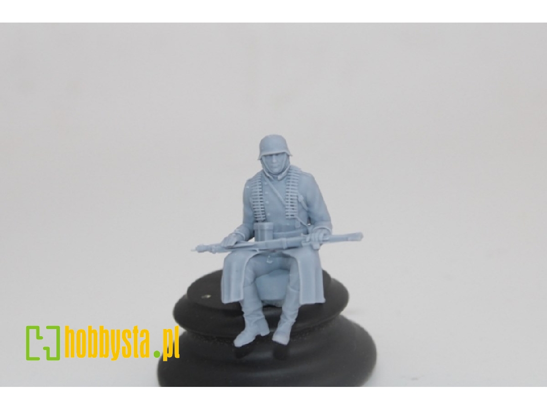 German Soldier Sitting In Greycoat With Mg42 - image 1