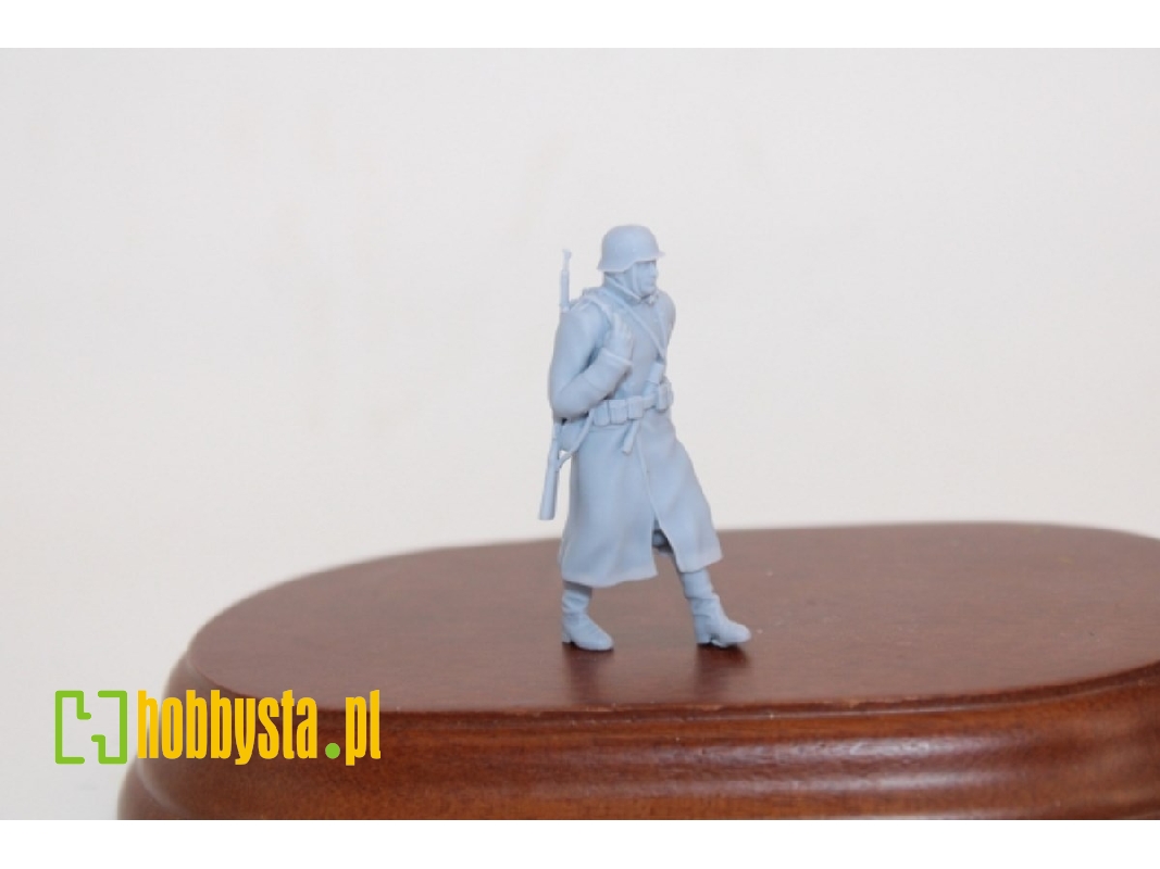 German Soldier Walking In Greycoat With Steelhelmet And Karabiner 98k - image 1